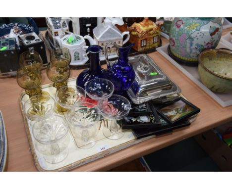 A tray comprising: six champagne glasses; four ring blown wines; a blue glass ewer; a blue glass decanter (stopper lacking); 