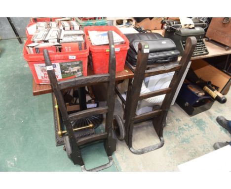Two vintage porter's barrows
