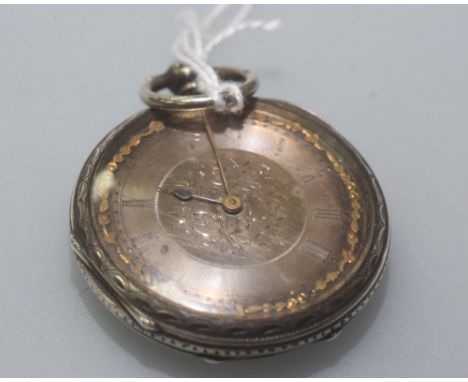 A Victorian silver pocket watch, Birmingham 1882, with engine turned decoration.