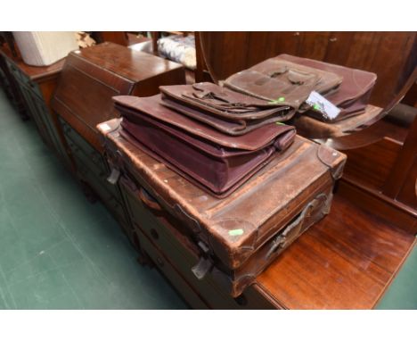 Two vintage leather satchels; tog. with an attractive vintage leather suitcase