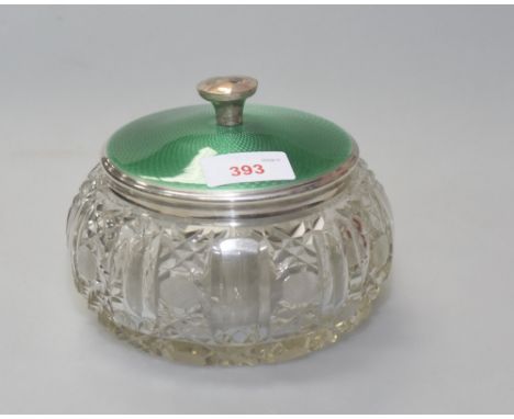 An Art Deco silver and enamel topped cut glass dressing table jar, Birmingham 1928