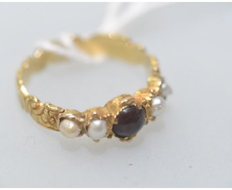 A 19th century garnet and seed pearl ring, the garnet cabochon mounted between four pearls on a yellow gold (unmarked) engrav