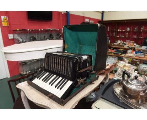 A Hohner Student III piano accordion, cased