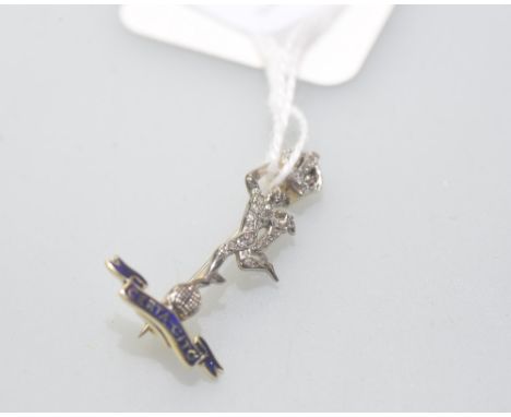 A Royal Corps of Signals 14ct gold and platinum brooch, with blue enamel swag and motto 'Certa-Cito', stamped marks to revers