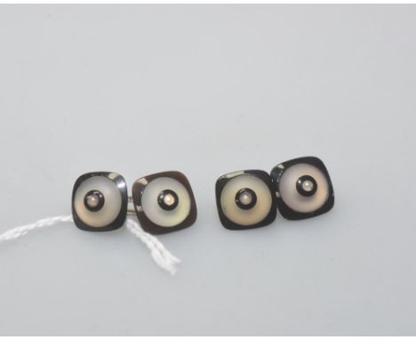 A pair of 14ct gold, black onyx and seed pearl cufflinks in the Art Deco taste, each double sided with chain link. 