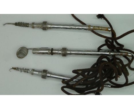 Three dentist's tools