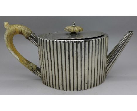 A George III silver teapot, London 1786, weight 539g