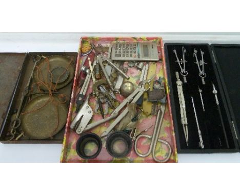 A technical drawing set, a set of scales and other drawing tools, etc.