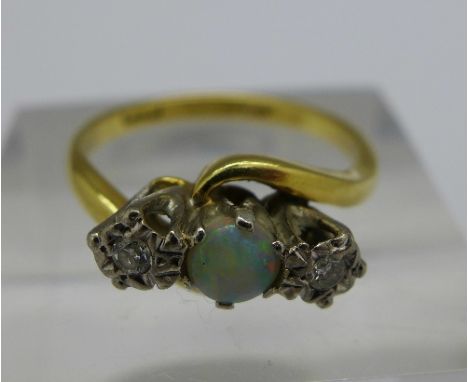 An 18ct gold, platinum set diamond and opal ring, weight 4g, size O