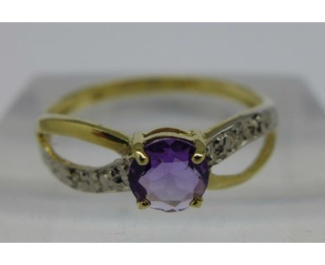 A 9ct gold, diamond and amethyst ring, weight 1.1g, size O