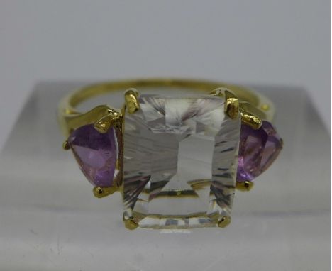 A 9ct gold, amethyst and topaz ring, weight 1.8g, size O