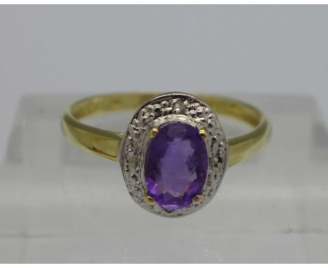 A 9ct gold, diamond and amethyst ring, weight 1.2g, size O