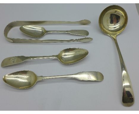 Three Irish silver spoons, a ladle and a pair of Georgian silver sugar bows, weight 120g