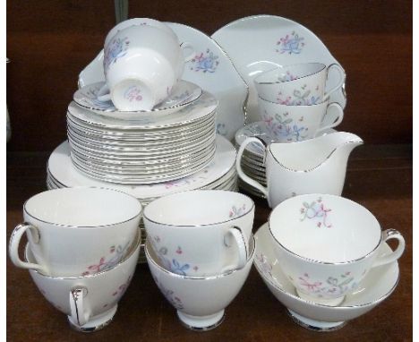 Royal Albert Button and Bows tea ware including side plates and medium plates, 48 pieces in total