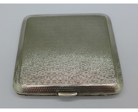 A silver cigarette case, London 1927, weight 98g