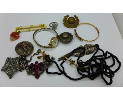 Seven brooches including silver, a bangle, pendant, ring, badge and wristwatch