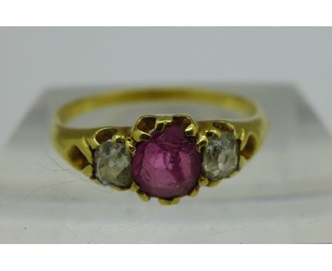 A yellow metal, diamond and ruby ring, weight 2.3g, size O