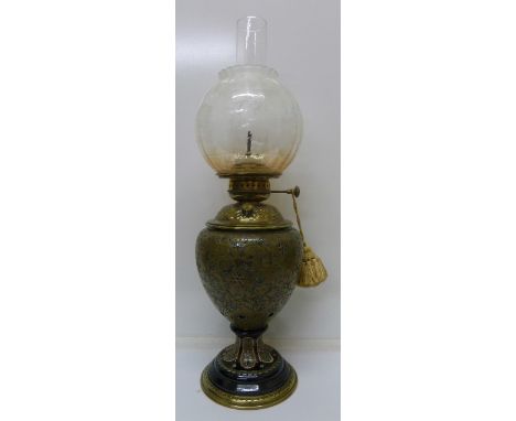 A stoneware and brass table lamp with associated glass shade signed Vianne, the stoneware base marked G & St, 4084, height 61