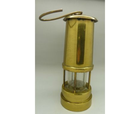A brass miner's lamp