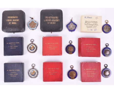 BOXED MUSIC MEDALS TO K.MACK;  boxed 1930s enamel medals  with details to lid when awarded  all to same person, 4 are silver 