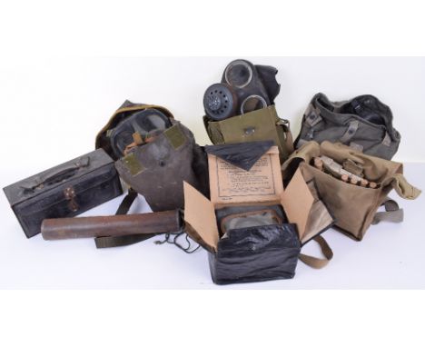 MIXED MILITARY EQUIPMENT; 1 civil gas mask,2 army gas masks in bag, US gas mask in bag, RAF first aid bag with content and 2 