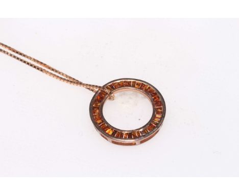 Red Diamond circular pendant and chain set in 9 carat yellow gold.