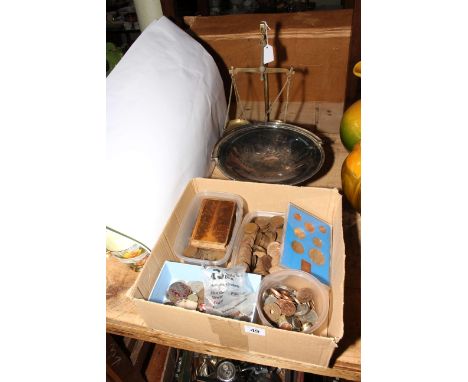 Collection of worldwide coinage, military medallions, postage scales, silver plated tazza and Dodge City toy.