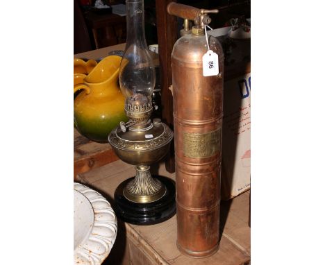French copper vintage fire extinguisher and brass oil lamp.
