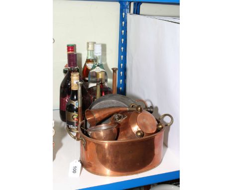 Collection of brass and copper wares including hunting horns, pans and funnels, together with six bottles of spirits, etc.