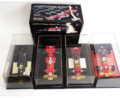 Four Formula 1 diecast model cars, 1:18 scale in display cases, one with original box, Team Lotus type 72C, Team Lotus type 7