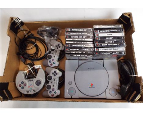 Vintage playstation console and 15 games, 3 controllers and 2 memory cards 