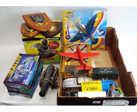 Mixed box of diecast vehicles, three Heller racing car plastic kits, three RAF shields, toy cannon and a Microsoft side winde