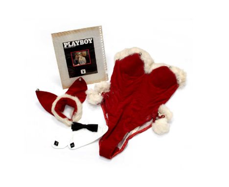 The Playboy Club: A Playboy Bunny Christmas Outfit, circa 1970's, the boned red velvet costume with rabbit fur trim highlight