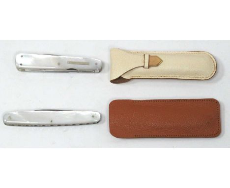An Ibberson Pocket Knife, with two blades, file, pick and scissors, mother of pearl scales, 7.7cm long, leather pouch and a L