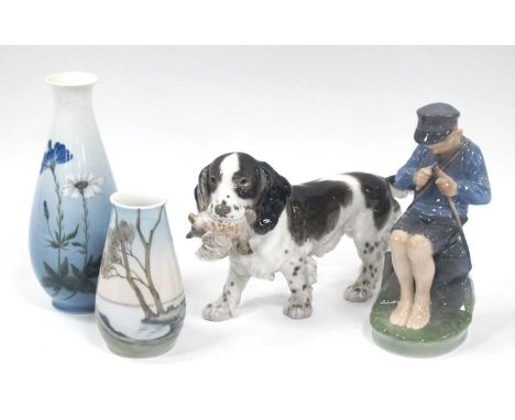 A Royal Copenhagen Porcelain Model of a Boy Whittling a Stick, printed and painted marks, model No 905, 19cm high; A Royal Co