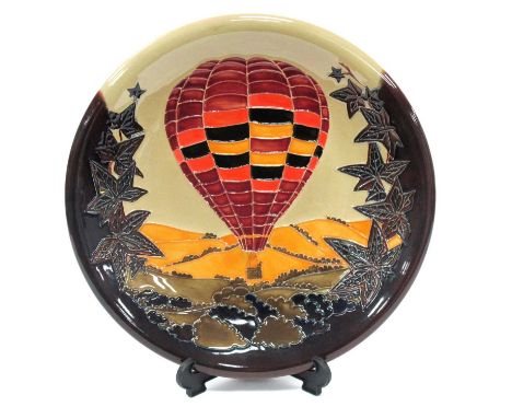 A Moorcroft Circular Pottery Plaque, specially commissioned by R &amp; R Collectibles Ltd, tubelined and painted with a hot a