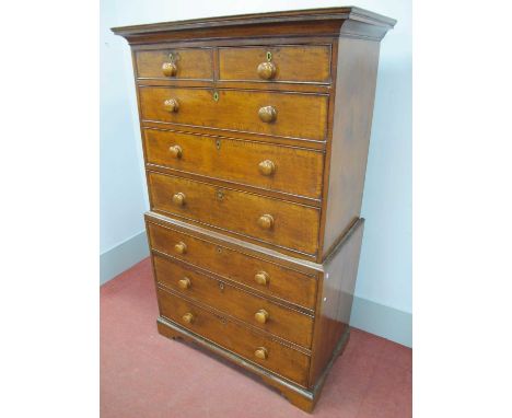 A Late XVIII Century Oak Chest on Chest, with moulded stepped cornice over two short and six long crossbanded drawers on brac