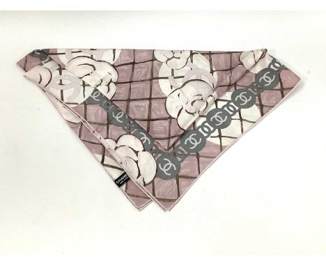 Chanel; A Silk Square Scarf, in a stylised camellia design on a pink ground with CC logo border, labelled 'Chanel Made in Ita