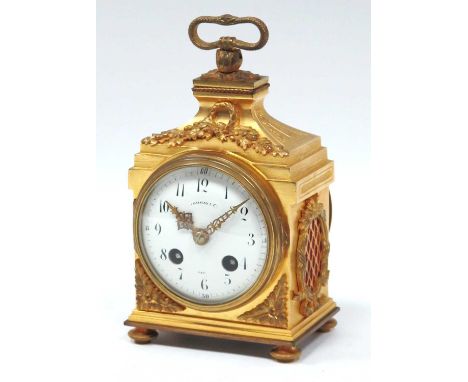 A Gilt Metal Striking Pendule D' Officier Clock, retailed by Thomas and CD, Paris, circa 1900, with serpent carrying handle, 