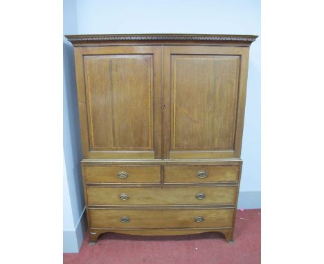 An Early XX Century Mahogany Linen Press, with panelled crossbanded doors, internal linen slides, the base with two short and