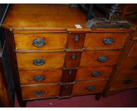 A 19th century Dutch elm commode, fitted with four long graduated drawers, flanked by canted angles, w.90cm, d.50cm, h.87cm 