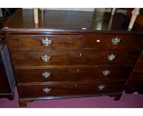 A George III mahogany square front chest of two short over three long drawers raised on bracket supports, width 125cm