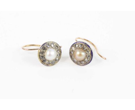 A pair of Victorian yellow metal, pearl and rose cut diamond earrings, each in a fine blue enamel surround, 3.6g, dia.9mm  So