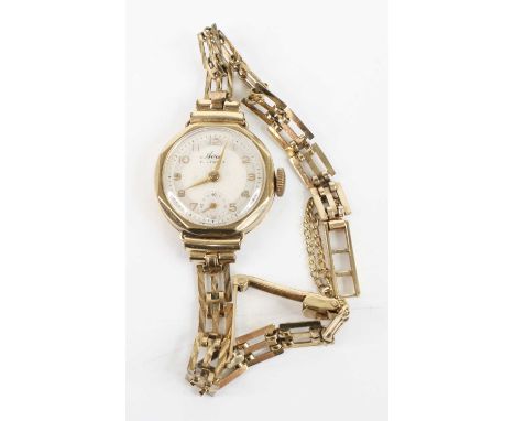 A lady's Avia 9ct gold cased manual wind wristwatch, on 9ct gold gatelink bracelet, 13.8g, case dia.22mm