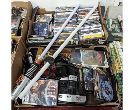 Two boxes of mixed computer games, light sabre etc 