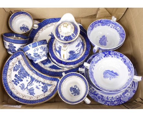 A collection of Willow pattern transfer decorated blue and white tableware, to include Spode and Booth's 