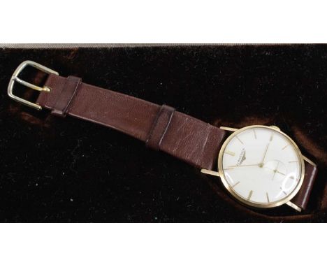 A vintage gent's Longines 9ct gold cased manual wind wristwatch, having a signed silvered dial, baton markers, subsidiary sec