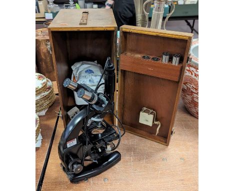 A 20th century Cooke Trowton &amp; Sims Ltd binocular microscope, in fitted wooden case