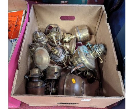 A collection of brass oil lamp burners 