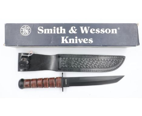 Smith &amp; Wesson combat knife, model SWCOM with leather sheath, boxed. UK P&amp;P Group 2 (£20+VAT for the first lot and £4